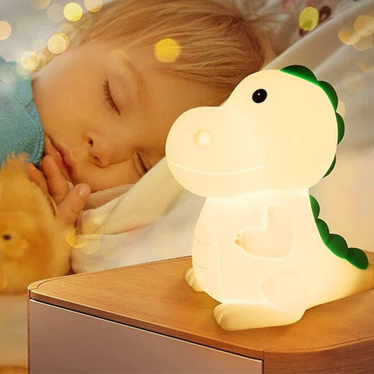 bebe paisiblement endormi grace lumiere douce veilleuse bebe dinosaurus