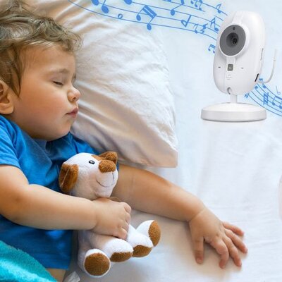 Bébé vêtu bleu avec peluche dans bras endormi sous douces sonorités caméra bébé vision claire
