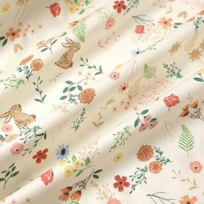 Drap housse lit bébé douceur et confort variante jardin aux lapins