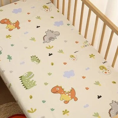 Drap housse lit bébé douceur sécurisée variante dinosaure
