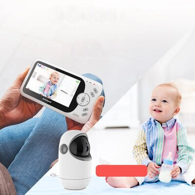 Maman surveillant bébé à travers moniteur caméra surveillance bébé vision nocturne 5m
