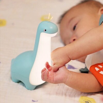 veilleuse bebe dinosaura a la luminosite adaptee