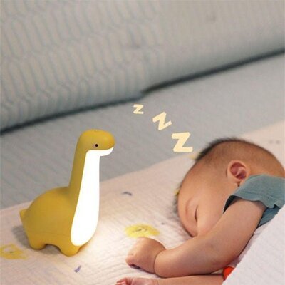 veilleuse bebe dinosaura conduit bebe vers pays des reves