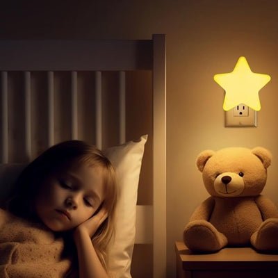 fillette endormie sous la lumiere envoutante veilleuse bebe dreamoon
